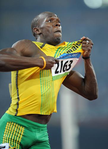 Usain Bolt of Jamaica clocked a new world record time of 19.30 seconds to win the Olympic 200m gold medal on Wednesday. Usain Bolt of Jamaica clocked a new world record time of 19.30 seconds to win the Olympic 200m gold medal on Wednesday.