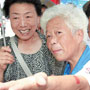 Elderly volunteer full of passion