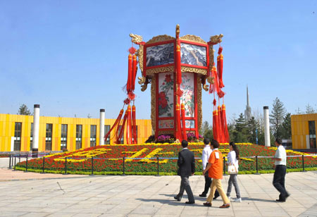 Staffs check the outdoor layout of the Seventh China Flowers Expo in Beijing, China, Sept. 23, 2009. Over 1,300 companies will participate in the Seventh China Flowers Expo that opens on Sept. 26. (Xinhua